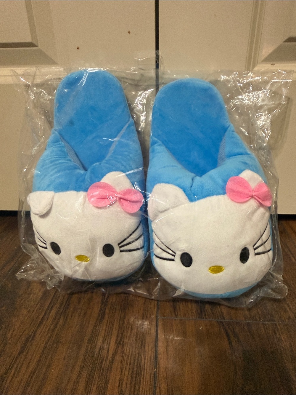 Kids hello Kitty Character Slippers with Pink Bow measures 10 inches.